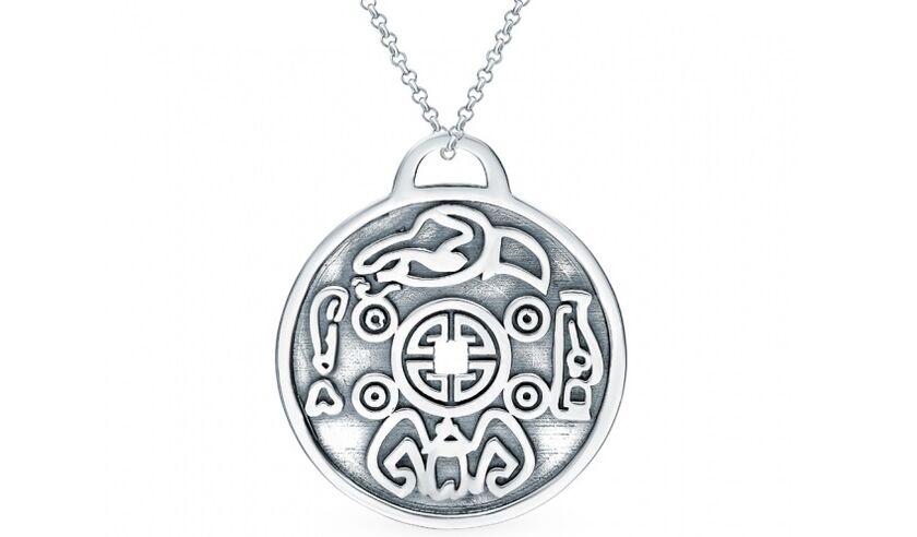 silver coin as an amulet of good luck