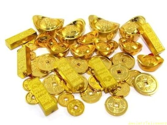 gold bars and coins as amulets of good luck